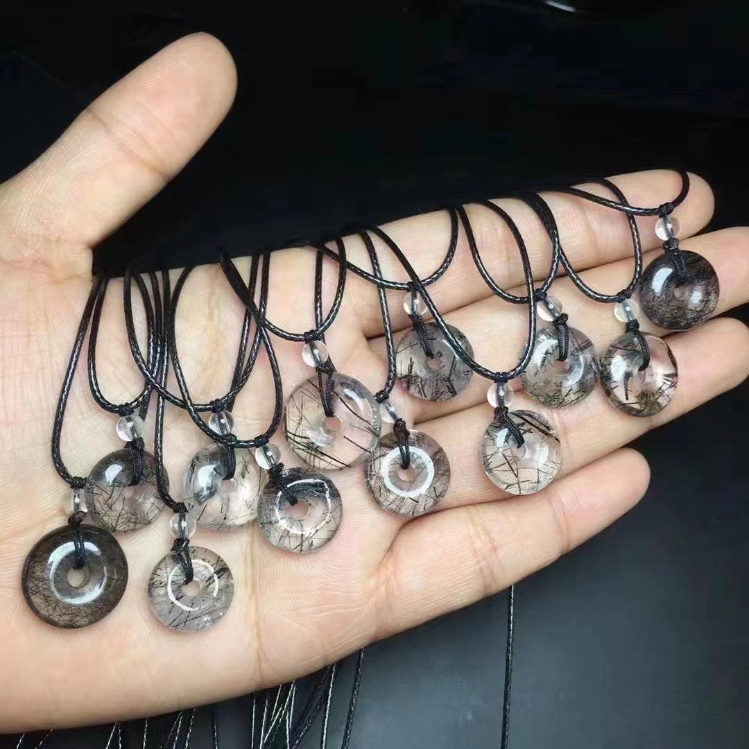 Crystal donut necklace with leather chain