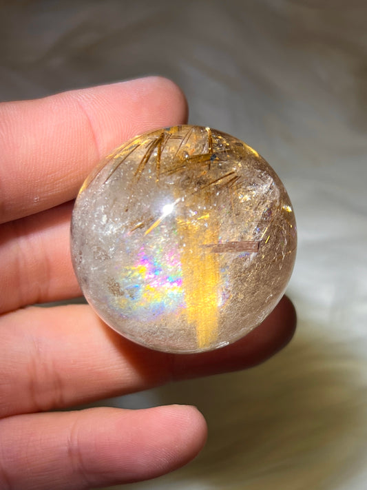 Gold rutile sphere (video)