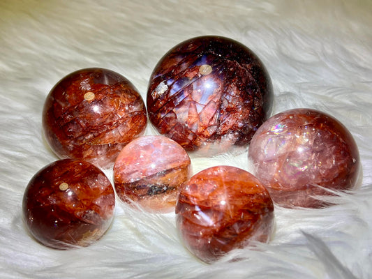 Starlight fire quartz sphere